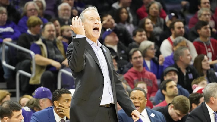 Feb 1, 2025; Evanston, Illinois, USA; Northwestern Wildcats head coach Chris Collins gestures to his team in a game against the Wisconsin Badgers during the first half at Welsh-Ryan Arena. Mandatory Credit: David Banks-Imagn Images