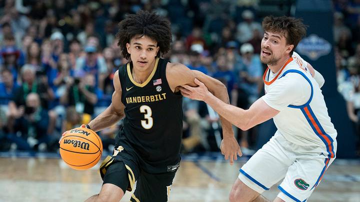 Vanderbilt guard Tyler Tanner (3) drives against Florida guard Urban Klavzar (7) during their semifinal game of the 2026 SEC Men’s Basketball Tournament at Bridgestone Arena in Nashville, Tenn., Saturday, March 14, 2026. Vanderbilt guard Tyler Tanner (3) drives against Florida guard Urban Klavzar (7) during their semifinal game of the 2026 SEC Men’s Basketball Tournament at Bridgestone Arena in Nashville, Tenn., Saturday, March 14, 2026.