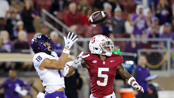 Aug 30, 2024; Stanford, California, USA; TCU Horned Frogs wide receiver Jack Bech (18) catches a pass against Stanford Cardinal safety Jay Green (5) during the second quarter at Stanford Stadium. Mandatory Credit: Sergio Estrada-Imagn Images Aug 30, 2024; Stanford, California, USA; TCU Horned Frogs wide receiver Jack Bech (18) catches a pass against Stanford Cardinal safety Jay Green (5) during the second quarter at Stanford Stadium. Mandatory Credit: Sergio Estrada-Imagn Images