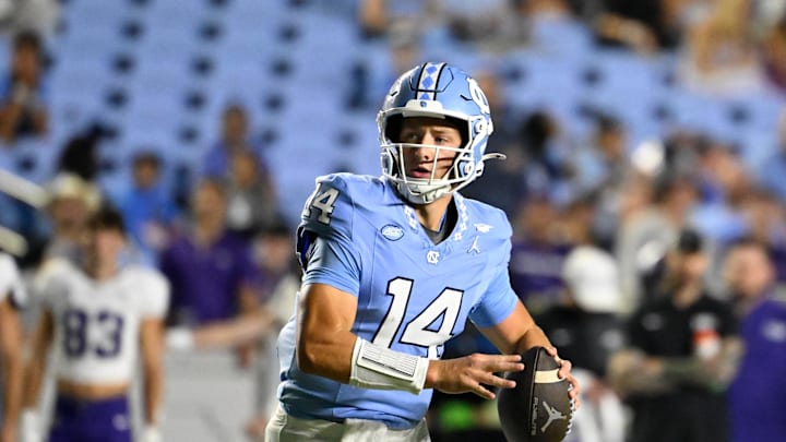 Sep 1, 2025; Chapel Hill, North Carolina, USA; North Carolina Tar Heels quarterback Max Johnson (14) looks to pass in the third quarter at Kenan Stadium. Mandatory Credit: Bob Donnan-Imagn Images