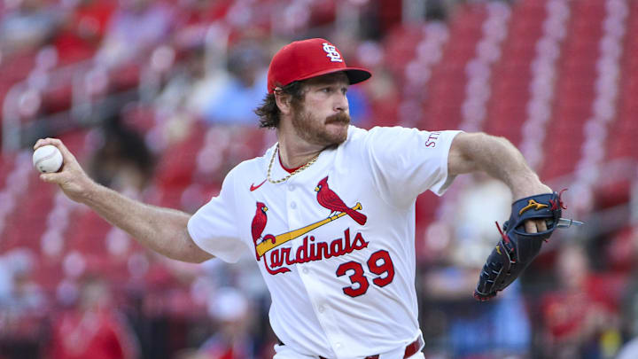 Aug 11, 2025; St. Louis, Missouri, USA;  St. Louis Cardinals starting pitcher Miles Mikolas (39) pitches against the Colorado Rockies during the first inning at Busch Stadium. Mandatory Credit: Jeff Curry-Imagn Images