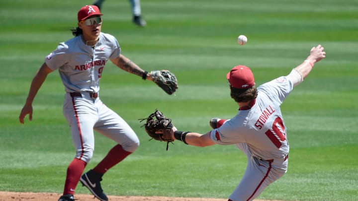 Apr 14, 2024; Tuscaloosa, AL, USA; A hard hit ball up the middle gets away from Arkansas second