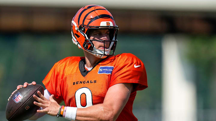 Cincinnati Bengals quarterback Joe Burrow (9) throws a pass during a preseason training camp practice in downtown Cincinnati on Wednesday, July 30, 2025.