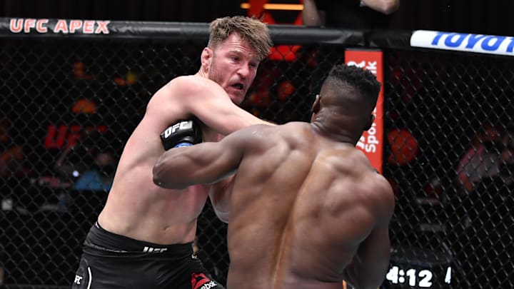 Mar 27, 2021; Las Vegas, NV, USA;  Stipe Miocic punches Francis Ngannou of Cameroon in their UFC heavyweight championship fight during the UFC 260 event at UFC APEX on March 27, 2021 in Las Vegas, Nevada.   Mandatory Credit: Jeff Bottari/Handout Photo via Imagn Images