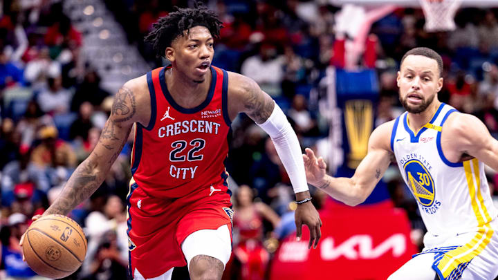 Nov 22, 2024; New Orleans, Louisiana, USA; New Orleans Pelicans guard Elfrid Payton (22) brings the ball up court against Golden State Warriors guard Stephen Curry (30) during first half at Smoothie King Center. Mandatory Credit: Stephen Lew-Imagn Images Nov 22, 2024; New Orleans, Louisiana, USA; New Orleans Pelicans guard Elfrid Payton (22) brings the ball up court against Golden State Warriors guard Stephen Curry (30) during first half at Smoothie King Center. Mandatory Credit: Stephen Lew-Imagn Images