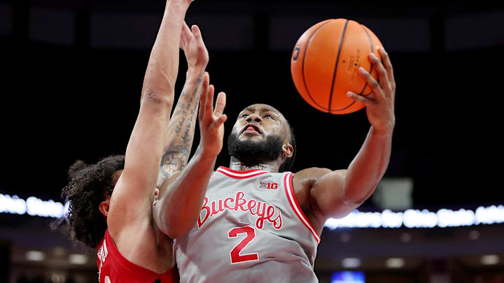 Feb 17, 2026; Columbus, Ohio, USA;  Ohio State Buckeyes guard Bruce Thornton (2) drives to the basket as Wisconsin Badgers guard Braeden Carrington (0) defends during the second half at Value City Arena. Mandatory Credit: Joseph Maiorana-Imagn Images