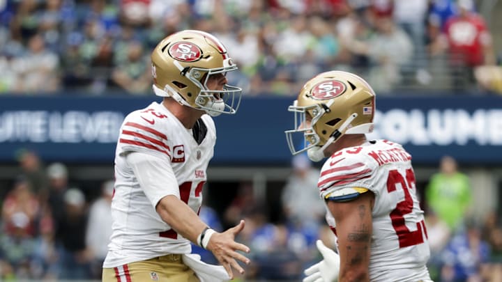 Sep 7, 2025; Seattle, Washington, USA; San Francisco 49ers quarterback Brock Purdy celebrates after throwing a touchdown pass against the Seattle Seahawks during the fourth quarter at Lumen Field. Mandatory Credit: Joe Nicholson-Imagn Images