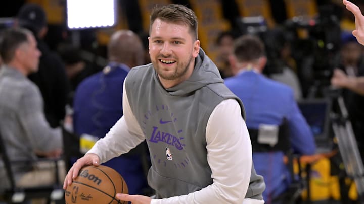 Feb 10, 2025; Los Angeles, California, USA;  Los Angeles Lakers guard Luka Doncic (77) warms up prior to the game against the Utah Jazz at Crypto.com Arena. Mandatory Credit: Jayne Kamin-Oncea-Imagn Images