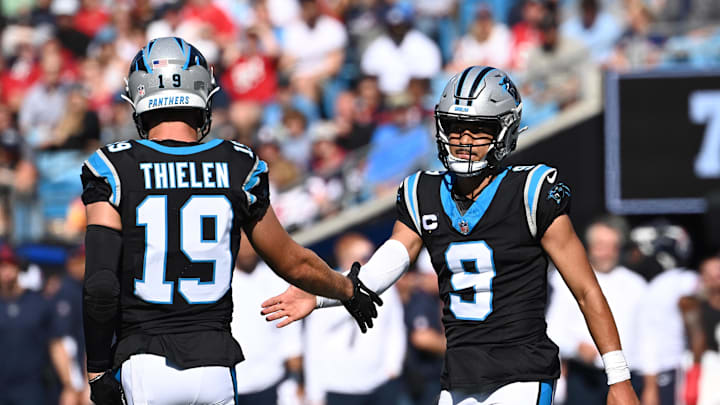 Oct 29, 2023; Charlotte, North Carolina, USA;  Carolina Panthers wide receiver Adam Thielen (19) and quarterback Bryce Young (9) react in the second quarter at Bank of America Stadium. Mandatory Credit: Bob Donnan-Imagn Images