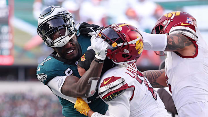 Jan 26, 2025; Philadelphia, PA, USA; Philadelphia Eagles wide receiver A.J. Brown (11) gets into a fight with Washington Commanders cornerback Marshon Lattimore (23) during the first half in the NFC Championship game at Lincoln Financial Field. Mandatory Credit: Bill Streicher-Imagn Images