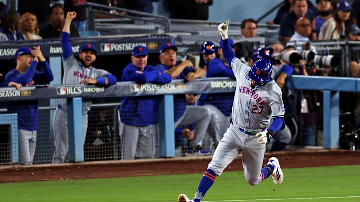 New York Mets third base Mark Vientos (27) celebrates after hitting a two run home run during the fourth inning against the Los Angeles Dodgers during game six of the NLCS for the 2024 MLB playoffs at Dodger Stadium.