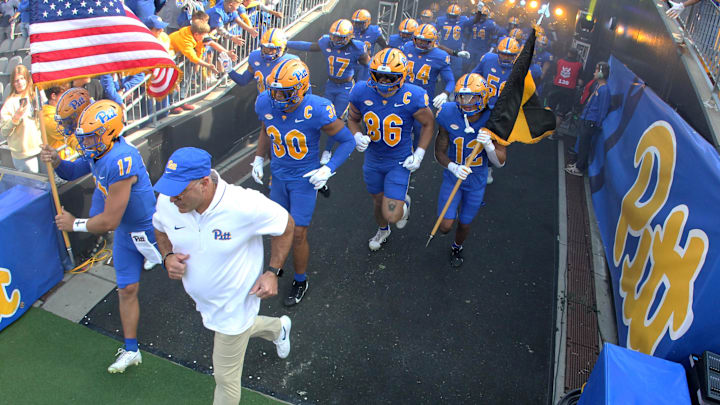 Oct 12, 2024; Pittsburgh, Pennsylvania, USA; Pittsburgh Panthers head coach Pat Narduzzi leads the Panthers onto the field to play the California Golden Bears at Acrisure Stadium. Mandatory Credit: Charles LeClaire-Imagn Images Oct 12, 2024; Pittsburgh, Pennsylvania, USA; Pittsburgh Panthers head coach Pat Narduzzi leads the Panthers onto the field to play the California Golden Bears at Acrisure Stadium. Mandatory Credit: Charles LeClaire-Imagn Images