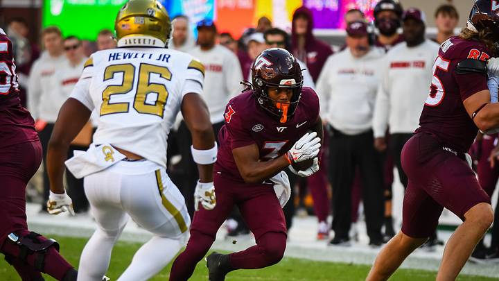 Oct 17, 2026; Blacksburg, Virginia, USA; Virginia Tech Hokies wide receiver Que'sean Brown (3) runs the ball as Georgia Tech Yellow Jackets defensive back Chris Hewitt Jr. (26) defends during the second quarter at Lane Stadium. Mandatory Credit: Brian Bishop-Imagn Images Oct 17, 2026; Blacksburg, Virginia, USA; Virginia Tech Hokies wide receiver Que'sean Brown (3) runs the ball as Georgia Tech Yellow Jackets defensive back Chris Hewitt Jr. (26) defends during the second quarter at Lane Stadium. Mandatory Credit: Brian Bishop-Imagn Images