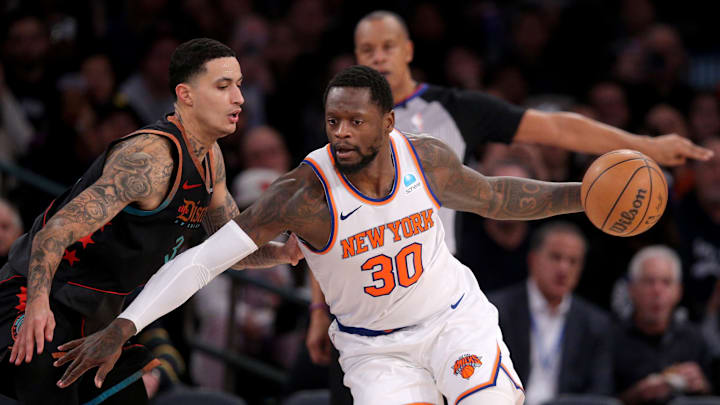 Jan 18, 2024; New York, New York, USA; New York Knicks forward Julius Randle (30) controls the ball against Washington Wizards forward Kyle Kuzma (33) during the third quarter at Madison Square Garden. Mandatory Credit: Brad Penner-USA TODAY Sports Jan 18, 2024; New York, New York, USA; New York Knicks forward Julius Randle (30) controls the ball against Washington Wizards forward Kyle Kuzma (33) during the third quarter at Madison Square Garden. Mandatory Credit: Brad Penner-USA TODAY Sports