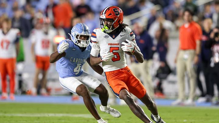 Oct 24, 2026; Chapel Hill, North Carolina, USA; Syracuse Orange wide receiver Calvin Russell III (5) runs with the ball during the fourth quarter against North Carolina Tar Heels at Kenan Stadium. Mandatory Credit: Cory Knowlton-Imagn Images Oct 24, 2026; Chapel Hill, North Carolina, USA; Syracuse Orange wide receiver Calvin Russell III (5) runs with the ball during the fourth quarter against North Carolina Tar Heels at Kenan Stadium. Mandatory Credit: Cory Knowlton-Imagn Images