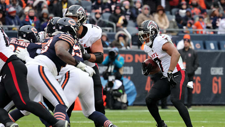Dec 31, 2023; Chicago, Illinois, USA; Atlanta Falcons running back Bijan Robinson (7) rushes the