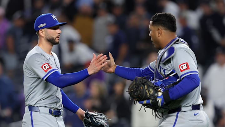 Oct 7, 2024; Bronx, New York, USA; Kansas City Royals pitcher Lucas Erceg (60) reacts with catcher Salvador Perez (13) after the final out in game two of the ALDS against the New York Yankees for the 2024 MLB Playoffs at Yankee Stadium.