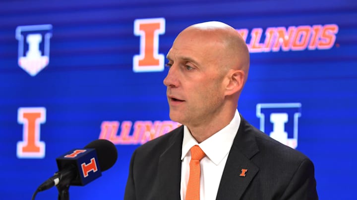 Dec 29, 2023; Champaign, Illinois, USA; Josh Whitman, Director of Athletics at the University of Illinois, addresses the media over the suspension of player Terrence Shannon Jr. after a rape charge on Dec.5. The address to the media came before a game with Fairleigh Dickinson at State Farm Center. Mandatory Credit: Ron Johnson-Imagn Images Dec 29, 2023; Champaign, Illinois, USA; Josh Whitman, Director of Athletics at the University of Illinois, addresses the media over the suspension of player Terrence Shannon Jr. after a rape charge on Dec.5. The address to the media came before a game with Fairleigh Dickinson at State Farm Center. Mandatory Credit: Ron Johnson-Imagn Images