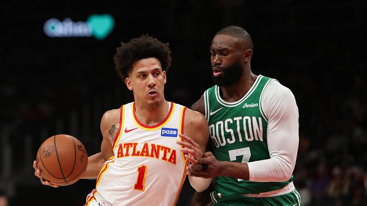 Mar 30, 2026; Atlanta, Georgia, USA; Atlanta Hawks forward Jalen Johnson (1) works past Boston Celtics guard Jaylen Brown (7) in the second half at State Farm Arena. Mandatory Credit: Mady Mertens-Imagn Images