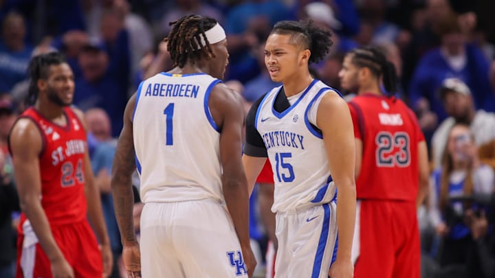 Dec 20, 2025; Atlanta, Georgia, USA; Kentucky Wildcats guard Denzel Aberdeen (1) and guard Jaland Lowe (15) show emotion against the St. John's basketball in the second half at State Farm Arena. Dec 20, 2025; Atlanta, Georgia, USA; Kentucky Wildcats guard Denzel Aberdeen (1) and guard Jaland Lowe (15) show emotion against the St. John's basketball in the second half at State Farm Arena.