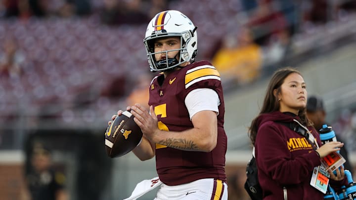Oct 11, 2025; Minneapolis, Minnesota, USA; Minnesota Golden Gophers quarterback Drake Lindsey (5) warms up before the game against the Purdue Boilermakers at Huntington Bank Stadium. Mandatory Credit: Matt Krohn-Imagn Images