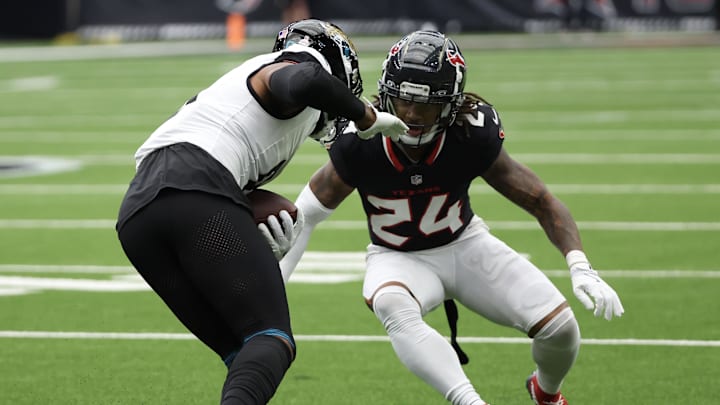 Sep 29, 2024; Houston, Texas, USA; Jacksonville Jaguars wide receiver Gabe Davis (0) runs against Houston Texans cornerback Derek Stingley Jr. (24) in the first quarter at NRG Stadium. Mandatory Credit: Thomas Shea-Imagn Images
