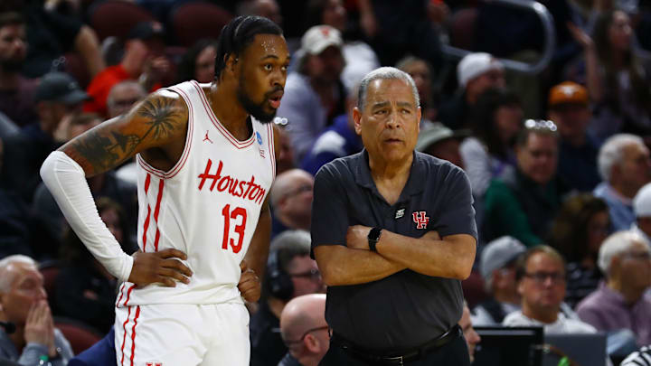 Houston Cougars forward J'Wan Roberts (13) talks with head coach Kelvin Sampson during a break in play against the Gonzaga Bulldogs during the first half at Intrust Bank Arena.