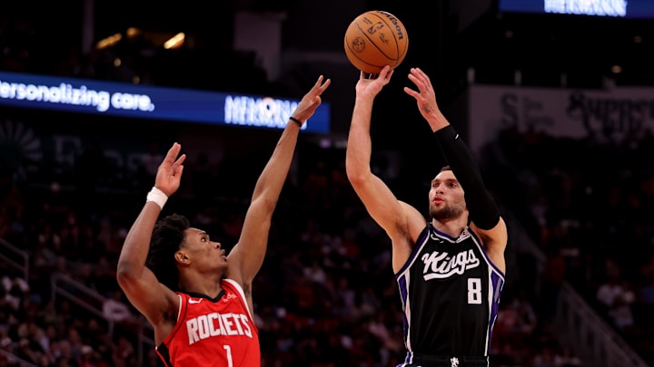 Mar 1, 2025; Houston, Texas, USA; Sacramento Kings guard Zach LaVine (8) shoots outside against Houston Rockets guard Amen Thompson (1) during the third quarter at Toyota Center. Mandatory Credit: Erik Williams-Imagn Images Mar 1, 2025; Houston, Texas, USA; Sacramento Kings guard Zach LaVine (8) shoots outside against Houston Rockets guard Amen Thompson (1) during the third quarter at Toyota Center. Mandatory Credit: Erik Williams-Imagn Images
