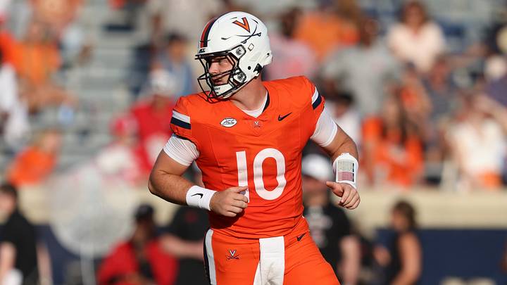 Aug 29, 2026; Charlottesville, Virginia, USA;  Virginia Cavaliers quarterback Eli Holstein (10) during the game against the North Carolina State Wolfpack at Scott Stadium.  Mandatory Credit: Greg Atkins-Imagn Images