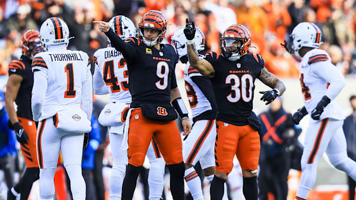 Dec 22, 2024; Cincinnati, Ohio, USA; Cincinnati Bengals quarterback Joe Burrow (9) reacts after advancing the ball with running back Chase Brown (30) in the first half against the Cleveland Browns at Paycor Stadium. Mandatory Credit: Katie Stratman-Imagn Images
