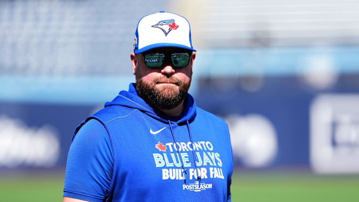 Oct 4, 2025; Toronto, Ontario, CAN; Toronto Blue Jays manager John Schneider (14) before game one against the New York Yankees in the ALDS round for the 2025 MLB playoffs at Rogers Centre. Mandatory Credit: Nick Turchiaro-Imagn Images Oct 4, 2025; Toronto, Ontario, CAN; Toronto Blue Jays manager John Schneider (14) before game one against the New York Yankees in the ALDS round for the 2025 MLB playoffs at Rogers Centre. Mandatory Credit: Nick Turchiaro-Imagn Images