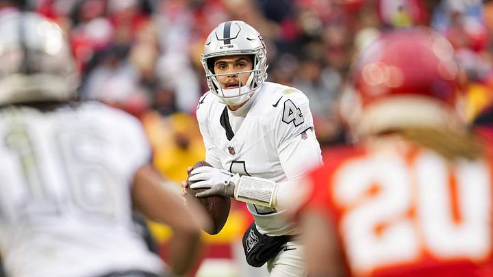 Dec 25, 2023; Kansas City, Missouri, USA; Las Vegas Raiders quarterback Aidan O'Connell (4) rolls out to pass against the Kansas City Chiefs during the second half at GEHA Field at Arrowhead Stadium. Mandatory Credit: Jay Biggerstaff-USA TODAY Sports Dec 25, 2023; Kansas City, Missouri, USA; Las Vegas Raiders quarterback Aidan O'Connell (4) rolls out to pass against the Kansas City Chiefs during the second half at GEHA Field at Arrowhead Stadium. Mandatory Credit: Jay Biggerstaff-USA TODAY Sports