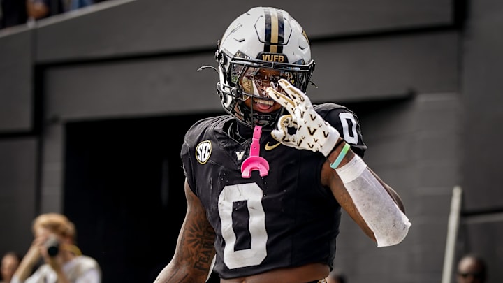 Vanderbilt wide receiver Junior Sherrill (0) celebrates his third touchdown against Utah State during the second quarter at FirstBank Stadium in Nashville, Tenn., Saturday, Sept. 27, 2025.