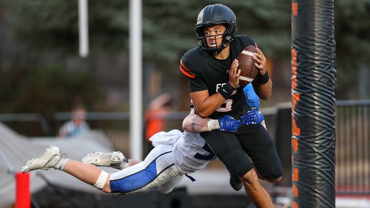 Coeur d'Alene's Dawson Riley sacks Silverton quarterback Quenton Lake during Friday's game Coeur d'Alene's Dawson Riley sacks Silverton quarterback Quenton Lake during Friday's game