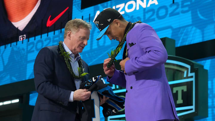 Apr 24, 2025; Green Bay, WI, USA; NFL commissioner Roger Goodell with Arizona Wildcats wide receiver Tetairoa McMillan after he is selected by the Carolina Panthers as the number eight pick in the first round of the 2025 NFL Draft at Lambeau Field. 