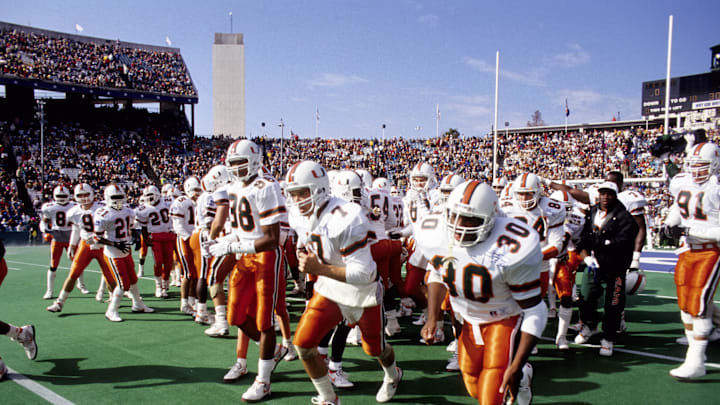 Jan 1, 1991; Dallas, TX, USA; FILE PHOTO; Miami Hurricanes running on to the field prior to the game against the Texas Longhorns at the 1991 Cotton Bowl. Miami Hurricanes beat the Texas Longhorns 46-3. Mandatory Credit: RVR Photos-Imagn Images 