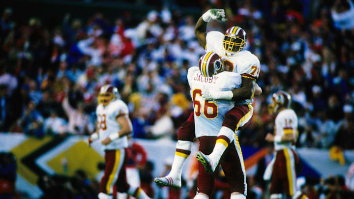 Jan 31, 1988; San Diego, CA, USA: FILE PHOTO; Washington Redskins tackle Mark May (73) and Joe Jacoby (66) celebrate against the Denver Broncos during Super Bowl XXII at Jack Murphy Stadium. The Redskins defeated the Broncos 42-10. Mandatory Credit: MPS-Imagn Images