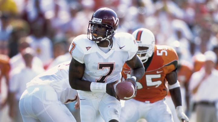 Nov 4, 2000; Miami, FL, USA: FILE PHOTO; Virginia Tech Hokies quarterback Michael Vick (7) in action against the Miami Hurricanes at the Orange Bowl.  Mandatory Credit: Imagn Images