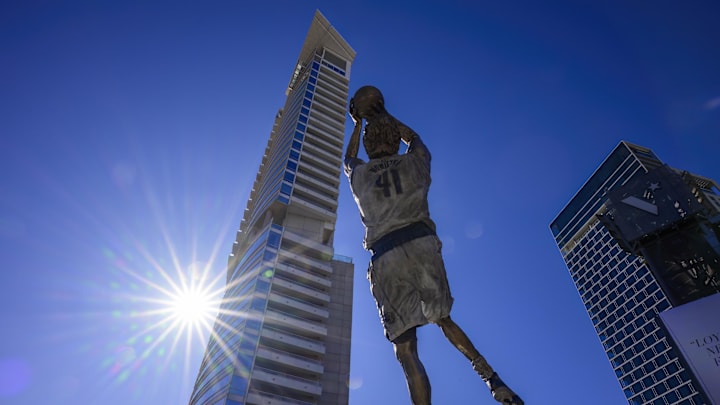 Dec 25, 2022; Dallas, Texas, USA; A general view of the Dallas city skyline and the statue by