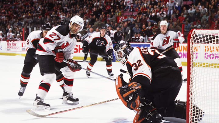 Unknown Date, 2001; East Rutherford, NJ, USA; FILE PHOTO; New Jersey Devils defensemen Scott Niedermayer (27) and Turner Stevenson (24) in action against Philadelphia Flyers goalie Roman Cechmanek (32), Kim Johnsson (5) and Simon Gagne (12) at Continental Airlines Arena. Mandatory Credit: Lou Capozzola-USA TODAY NETWORK