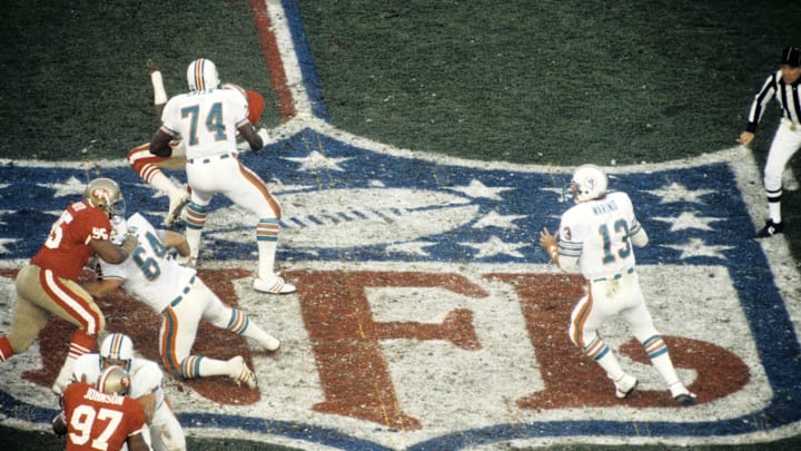 Miami Dolphins quarterback Dan Marino (13) prepares to throw against the San Francisco 49ers during Super Bowl XIX at Stanford Stadium. The 49ers defeated the Dolphins 38-16.