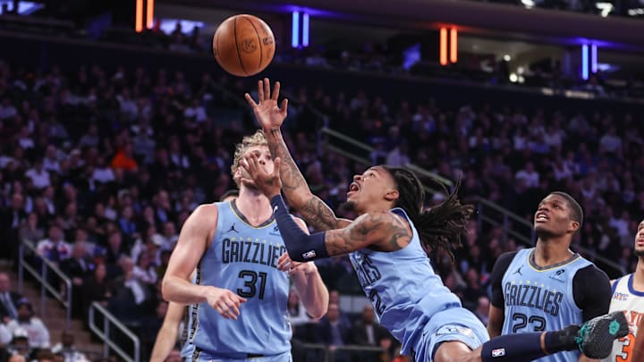 Nov 11, 2025; New York, New York, USA; Memphis Grizzlies guard Ja Morant (12) drives to the basket in the third quarter against the New York Knicks at Madison Square Garden. Mandatory Credit: Wendell Cruz-Imagn Images Nov 11, 2025; New York, New York, USA; Memphis Grizzlies guard Ja Morant (12) drives to the basket in the third quarter against the New York Knicks at Madison Square Garden. Mandatory Credit: Wendell Cruz-Imagn Images