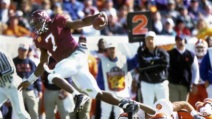 Jan 1, 2001; Jacksonville, FL, USA: FILE PHOTO; Virginia Tech Hokies quarterback Michael Vick (7) in action against the Clemson Tigers during the 2001 Gator Bowl at Alltel Stadium.  Mandatory Credit: USA TODAY Sports