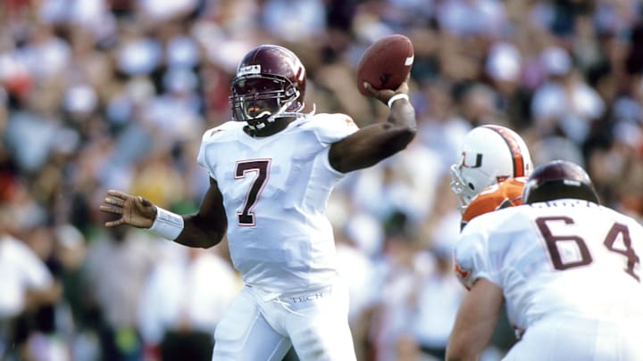 Nov 4, 2000; Miami, FL, USA: FILE PHOTO; Virginia Tech Hokies quarterback Michael Vick (7) in action against the Miami Hurricanes at the Orange Bowl.  Mandatory Credit: Imagn Images