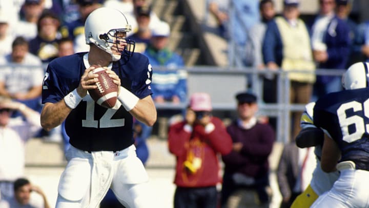 Quarterback Kerry Collins led the Penn State Nittany Lions to a 12-0 record in 1994, the team's last undefeated season. Quarterback Kerry Collins led the Penn State Nittany Lions to a 12-0 record in 1994, the team's last undefeated season.