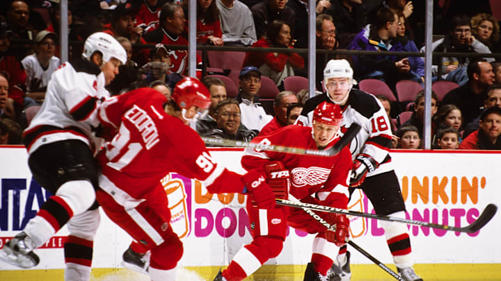 Jan 28, 2003; East Rutherford, NJ, USA; FILE PHOTO; Detroit Red Wings center Sergei Fedorov (91) and Igor Larionov (8) in action against New Jersey Devils defensemen Scott Stevens (4) and Sergei Brylin (18) at Continental Airlines Arena. Mandatory Credit: Lou Capozzola-USA TODAY NETWORK Jan 28, 2003; East Rutherford, NJ, USA; FILE PHOTO; Detroit Red Wings center Sergei Fedorov (91) and Igor Larionov (8) in action against New Jersey Devils defensemen Scott Stevens (4) and Sergei Brylin (18) at Continental Airlines Arena. Mandatory Credit: Lou Capozzola-USA TODAY NETWORK