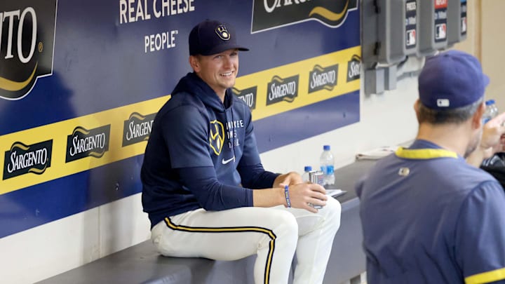 Walker McKinven talks with personnel before the Milwaukee Brewers play the St. Louis Cardinals in Milwaukee on Thursday, Sept. 23, 2021. Walker McKinven talks with personnel before the Milwaukee Brewers play the St. Louis Cardinals in Milwaukee on Thursday, Sept. 23, 2021.