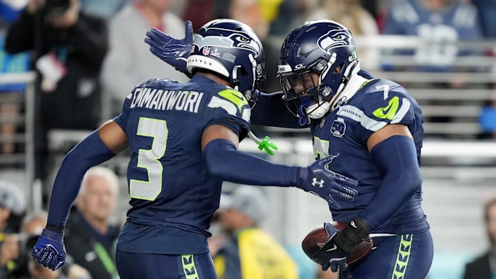 Feb 8, 2026; Santa Clara, CA, USA; Seattle Seahawks linebacker Uchenna Nwosu (7) celebrates with safety Nick Emmanwori (3) after scoring a touchdown against the New England Patriots during the fourth quarter in Super Bowl LX at Levi's Stadium. Mandatory Credit: Kyle Terada-Imagn Images