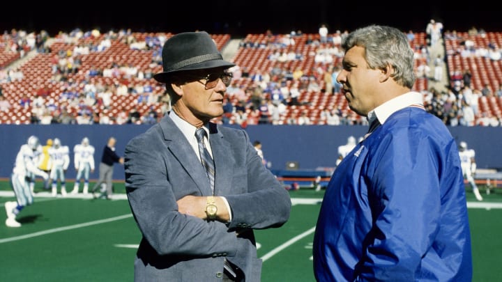 Nov 6, 1988; E. Rutherford, NJ, USA; FILE PHOTO; New York Giants head coach Bill Parcells talks with Dallas Cowboys head coach Tom Landry prior to the start of their game at Giants Stadium. Nov 6, 1988; E. Rutherford, NJ, USA; FILE PHOTO; New York Giants head coach Bill Parcells talks with Dallas Cowboys head coach Tom Landry prior to the start of their game at Giants Stadium.