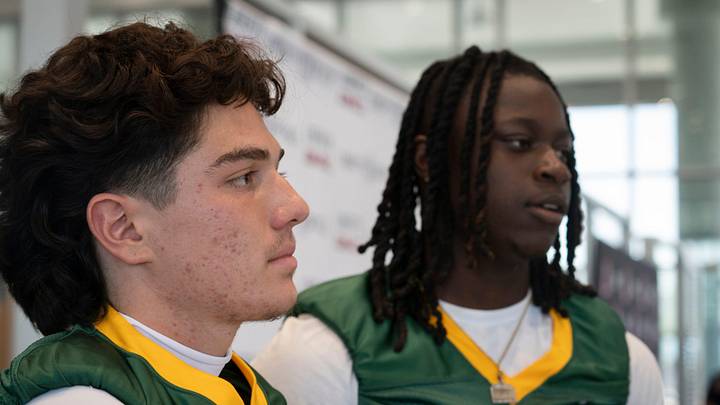 Peoria High quarterback Dominick Kramer and WR Dontay Tyson Jr., right, attended an August 2025 media day.
